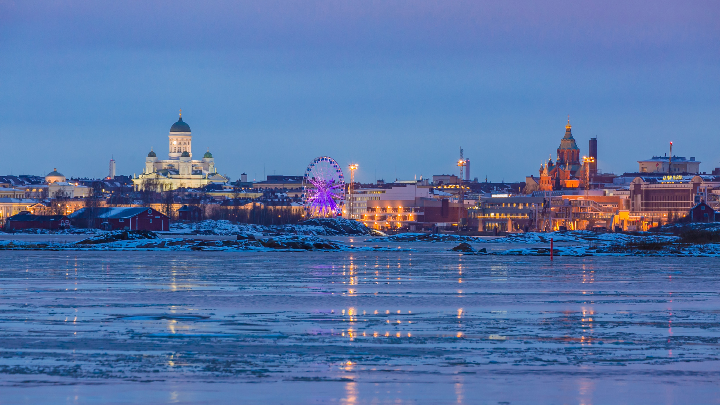 Helsinki Cathedral in the horizon, winter sea in the foreground