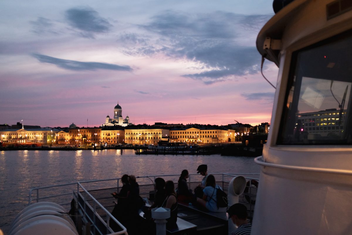 City of Helsinki in the background in the sunset, photo taken from the Suomenlinna ferry.